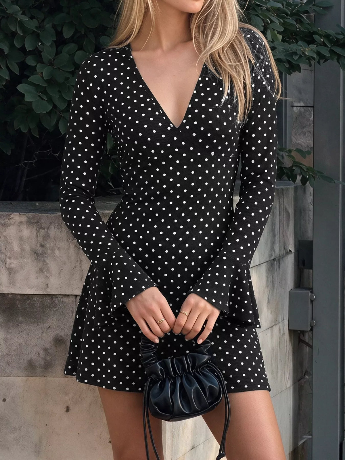 Black polka dot flounce sleeve mini dress, V-neck and front view