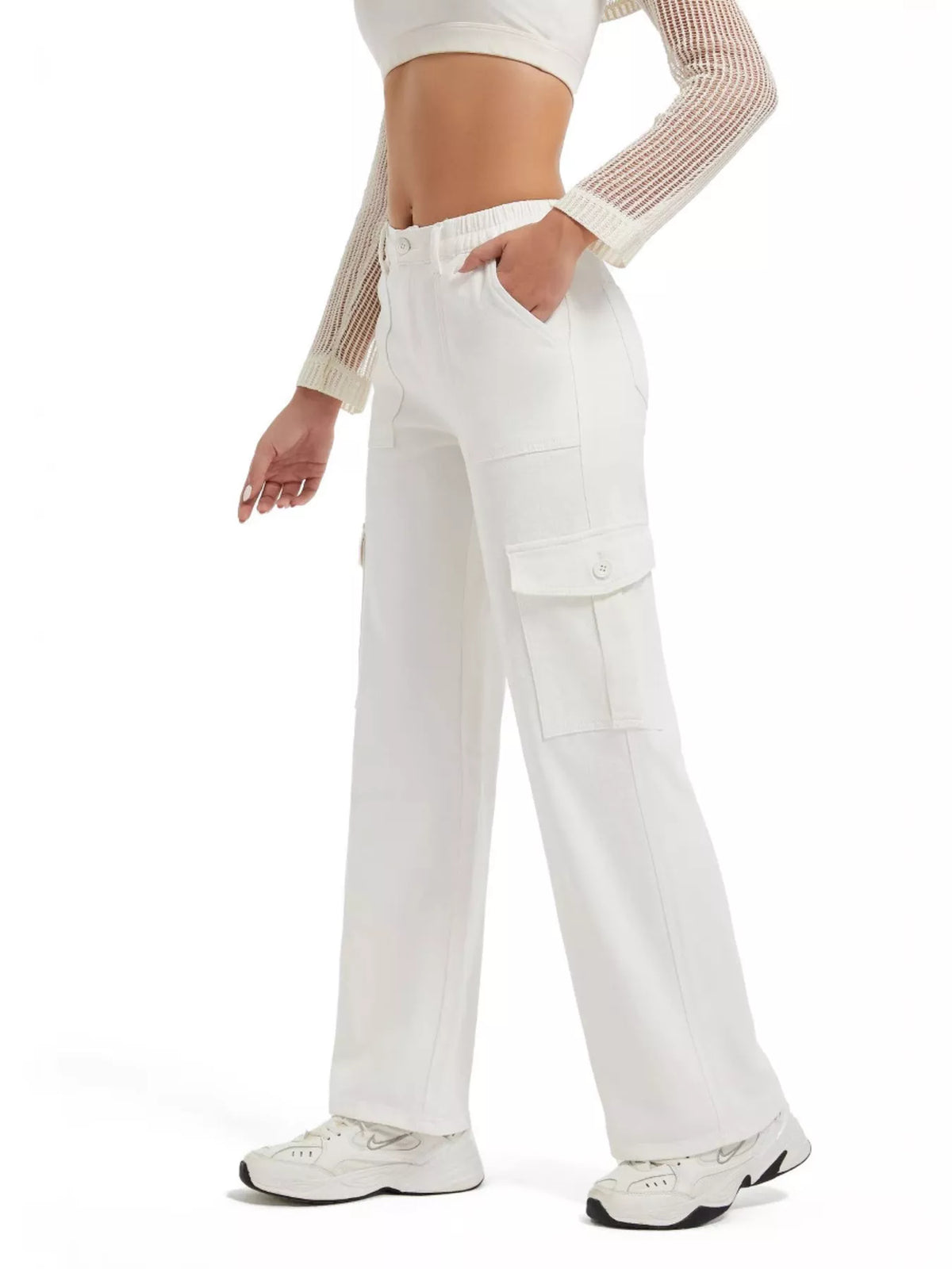 White wide-leg cargo jeans, side view with hand in pocket