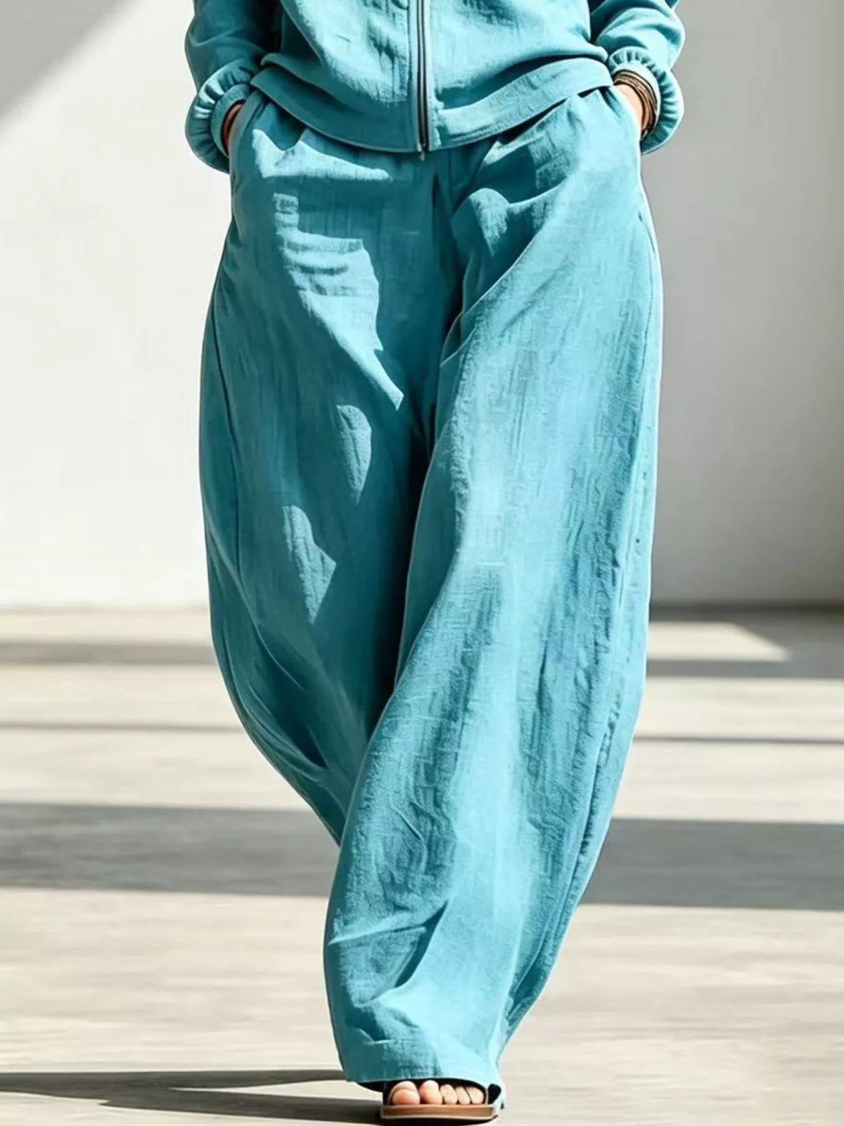Jacket and pants set, turquoise pants detail