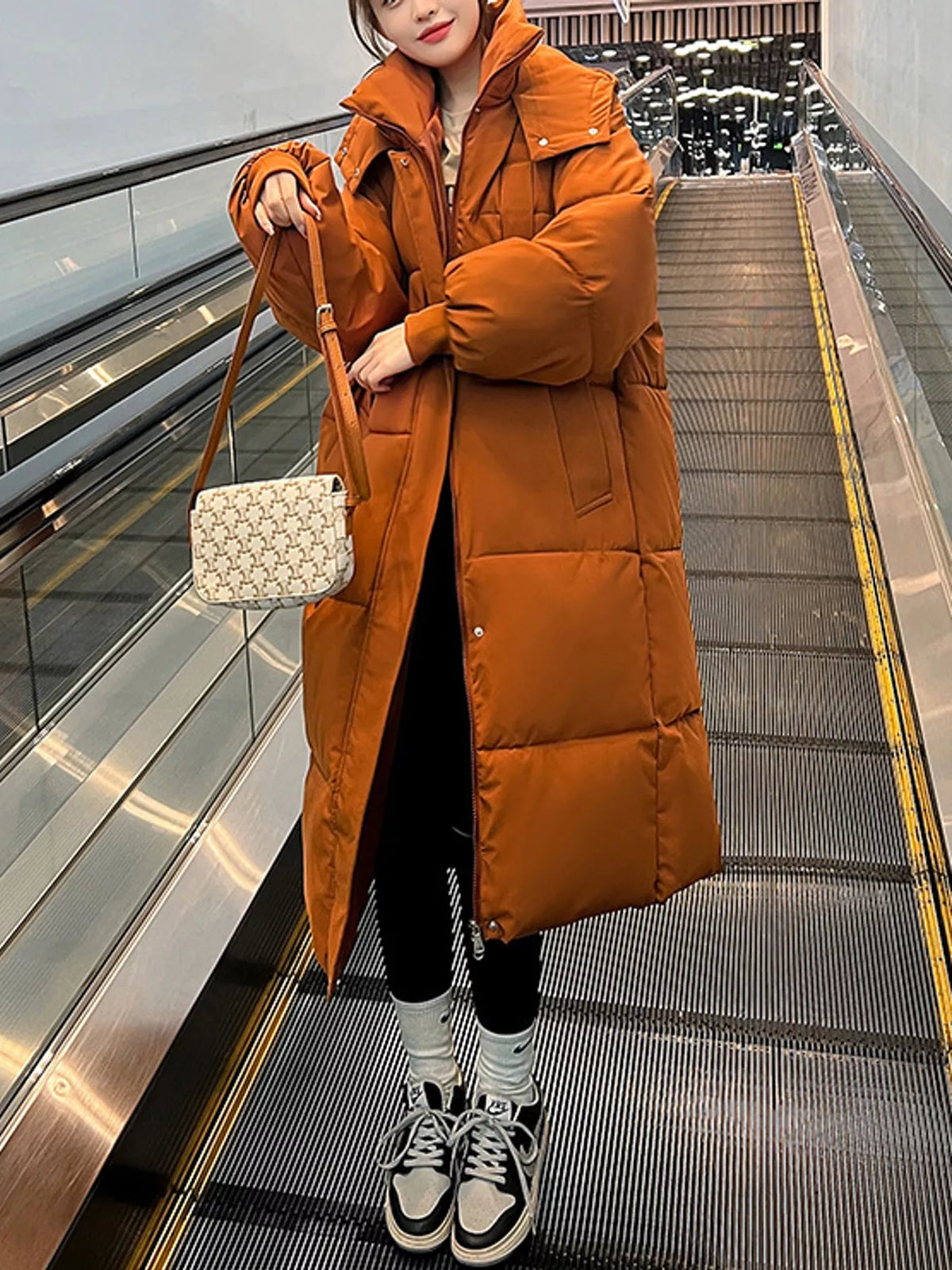Longline puffer coat, orange full front