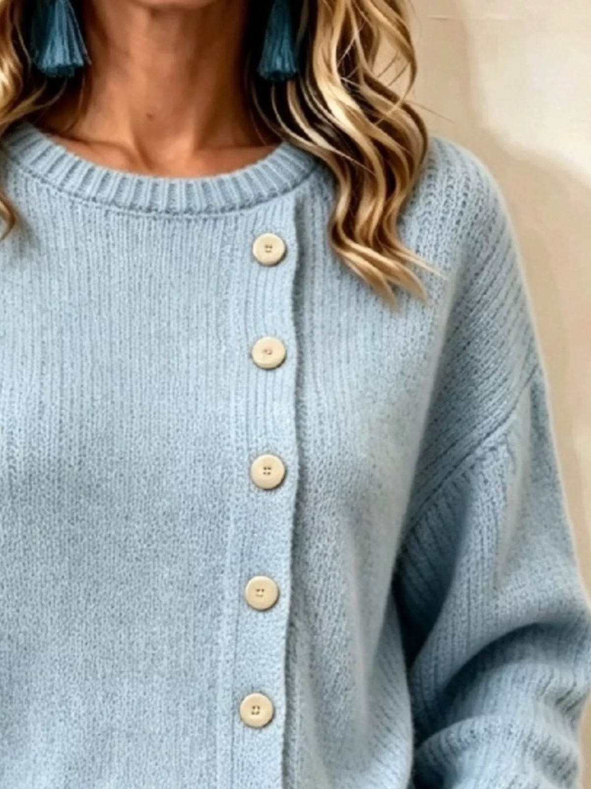 Women's Decorative Button Round Neck Sweater in light blue — button detail view