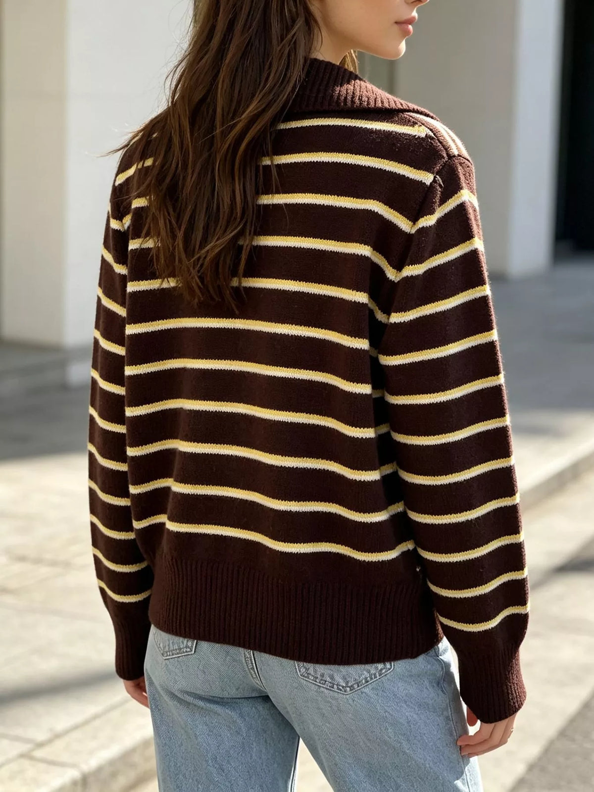Brown and cream striped polo-collar sweater, back view.