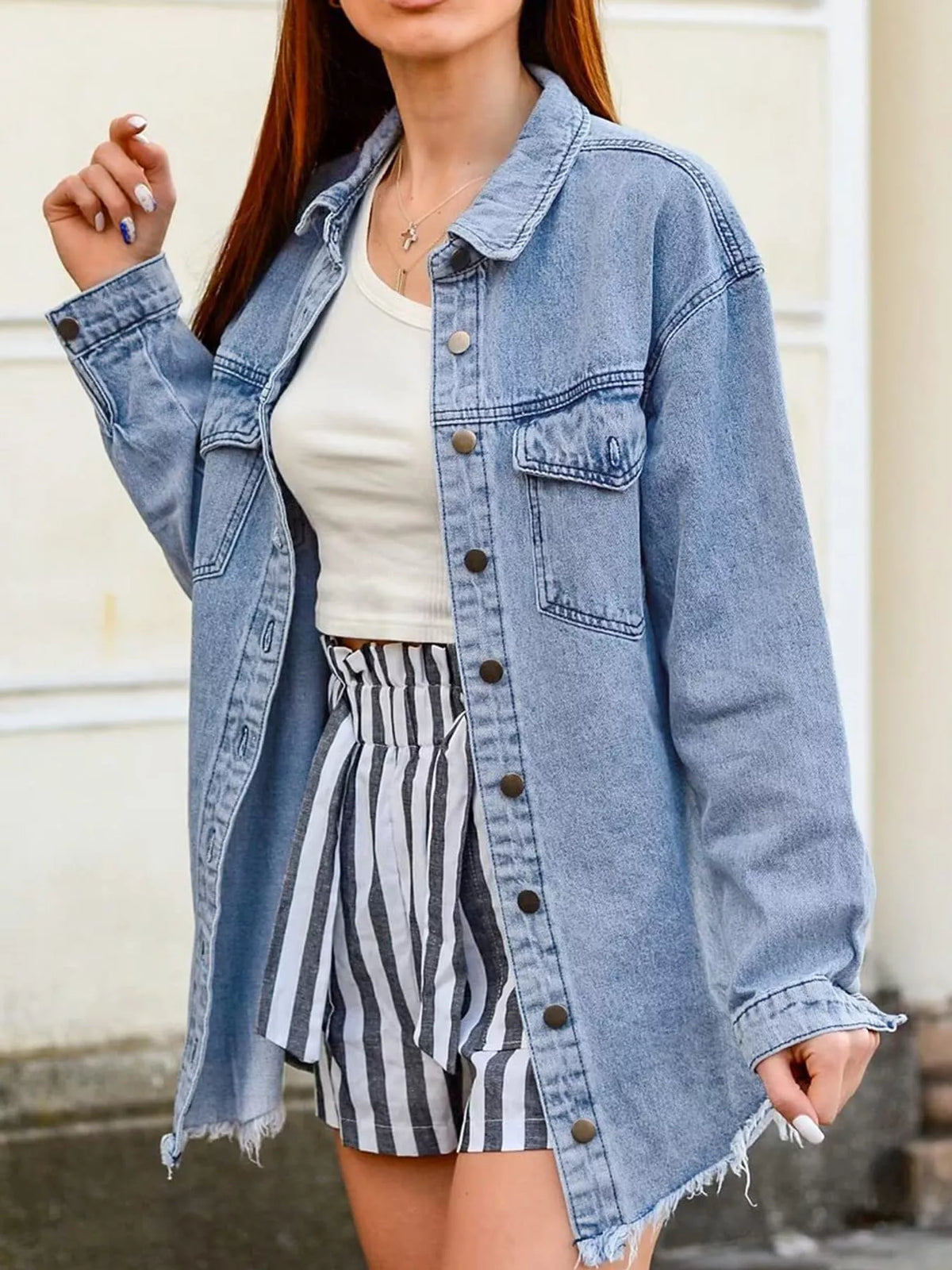 Blue raw hem button-up denim jacket — front view