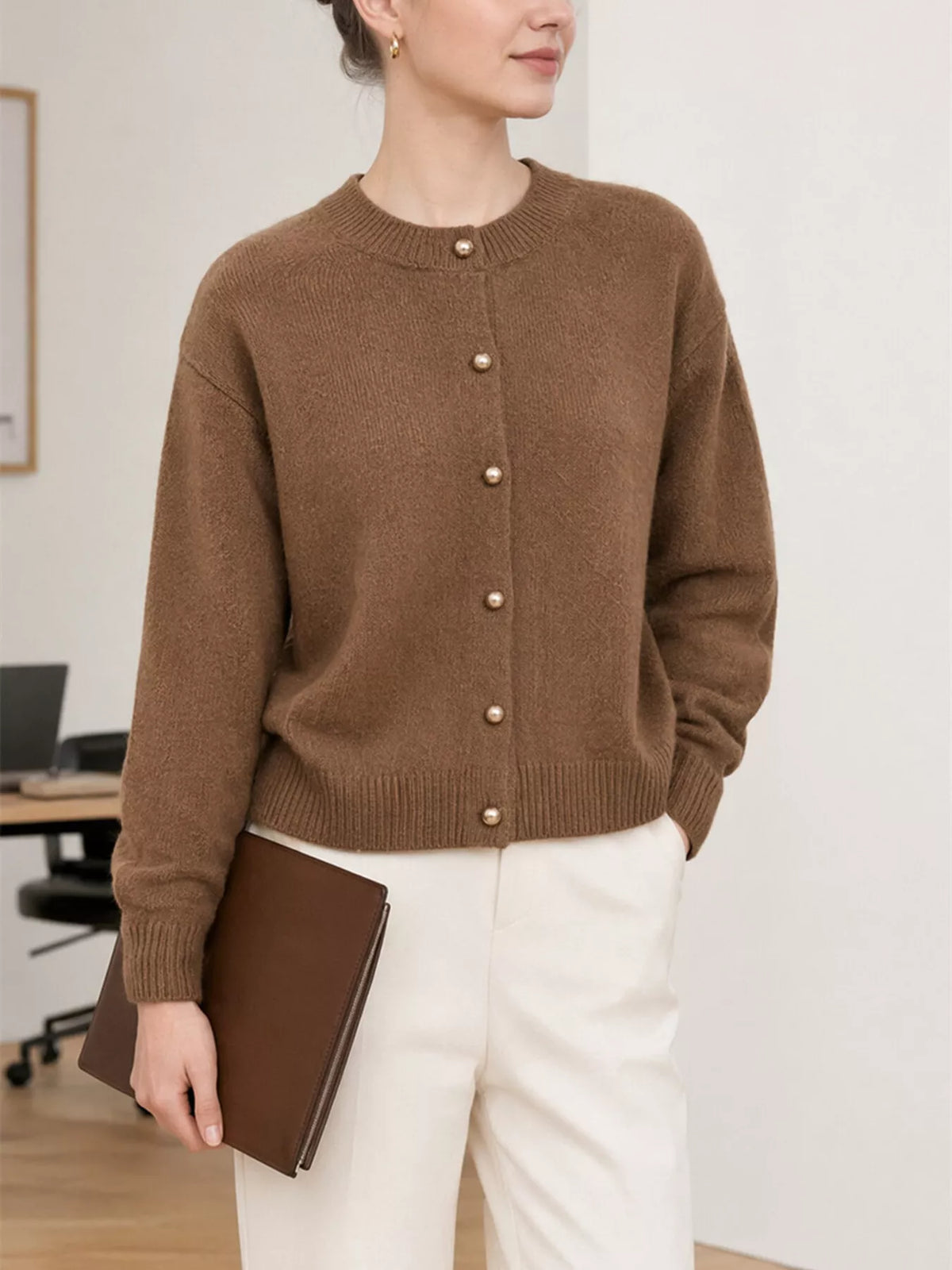 Brown round-neck button-front knit cardigan, front view.