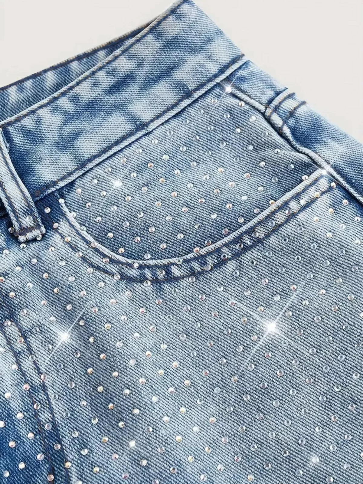 Light blue high-waisted rhinestone wide-leg jeans — design and construction details