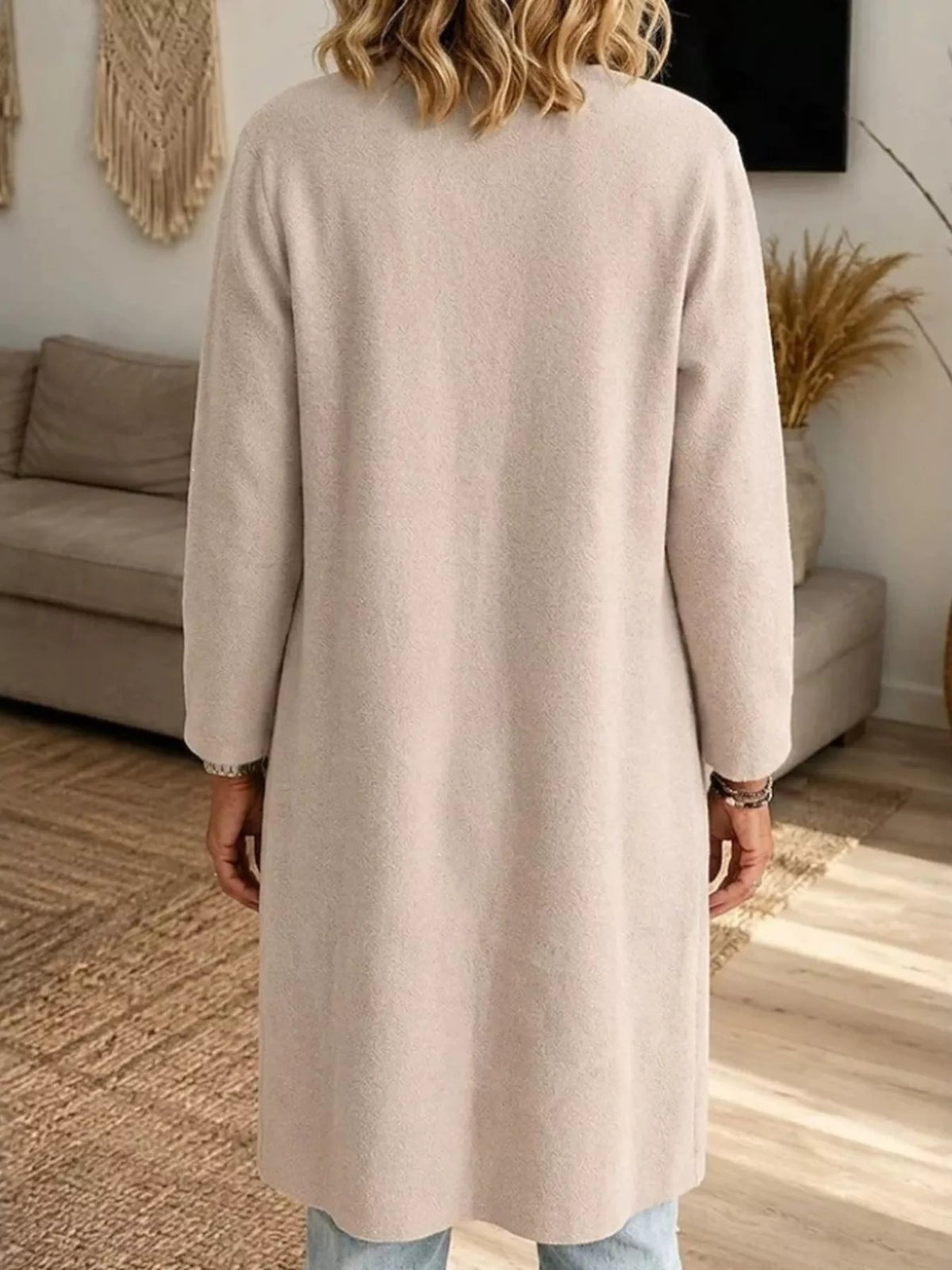 Beige open-front longline knit cardigan, back view