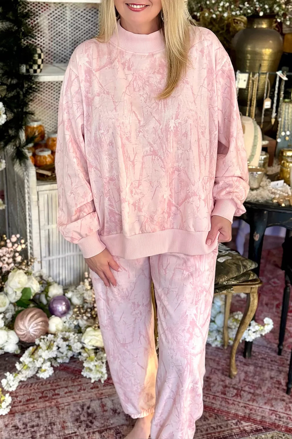Pink camouflage top and pants set, front styled view