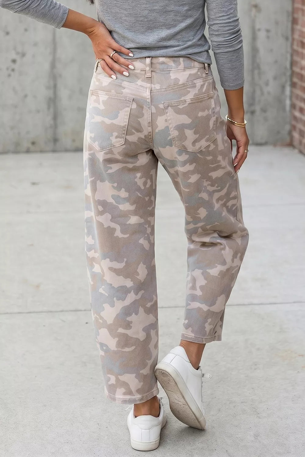 Beige camouflage barrel jeans, front view