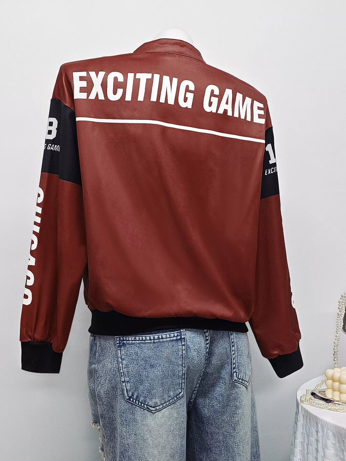 Burgundy and white letter-print zip-front jacket, back on mannequin