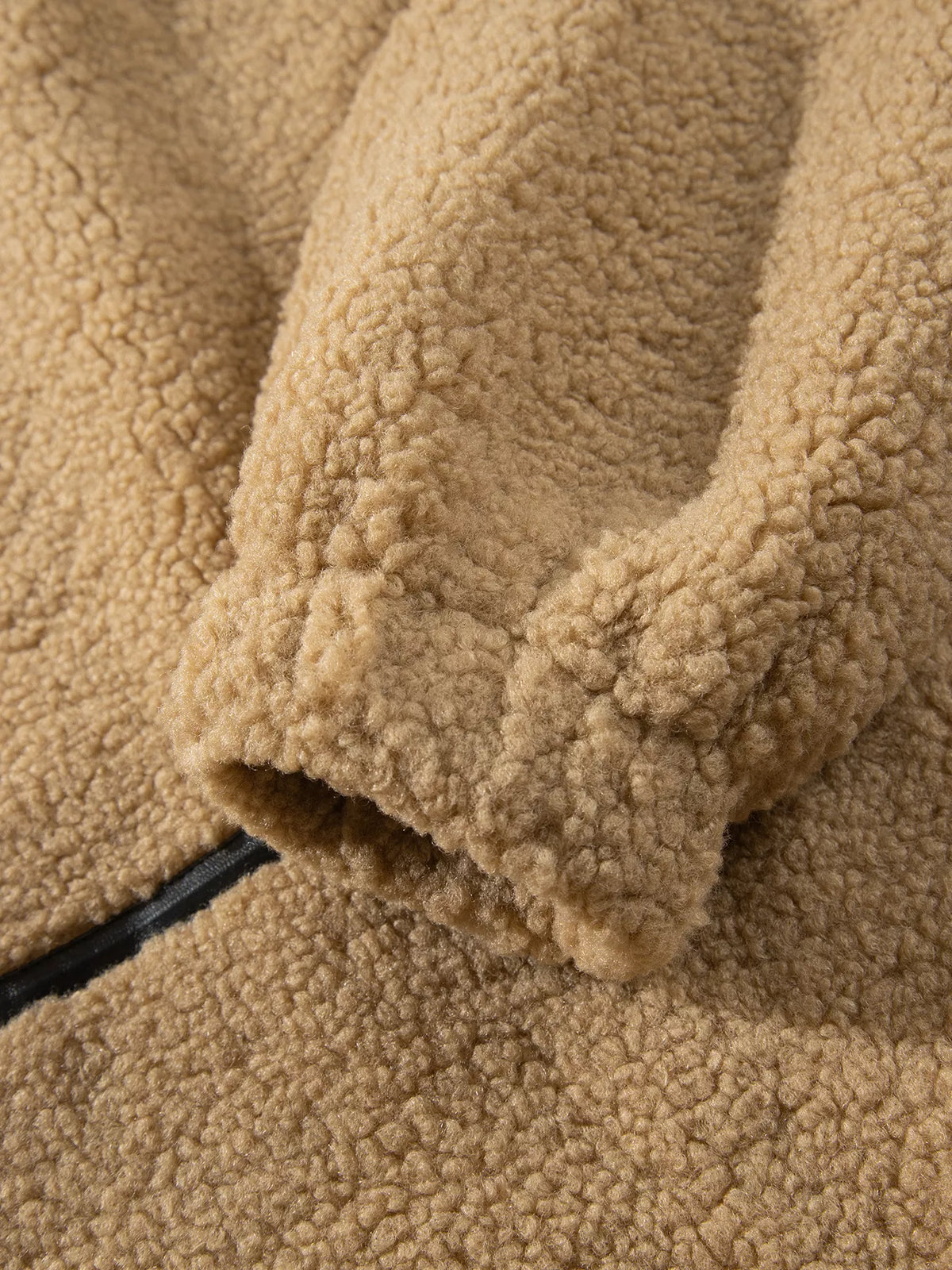 Camel fleece zip-front jacket with contrasting seam trim, cuff detail