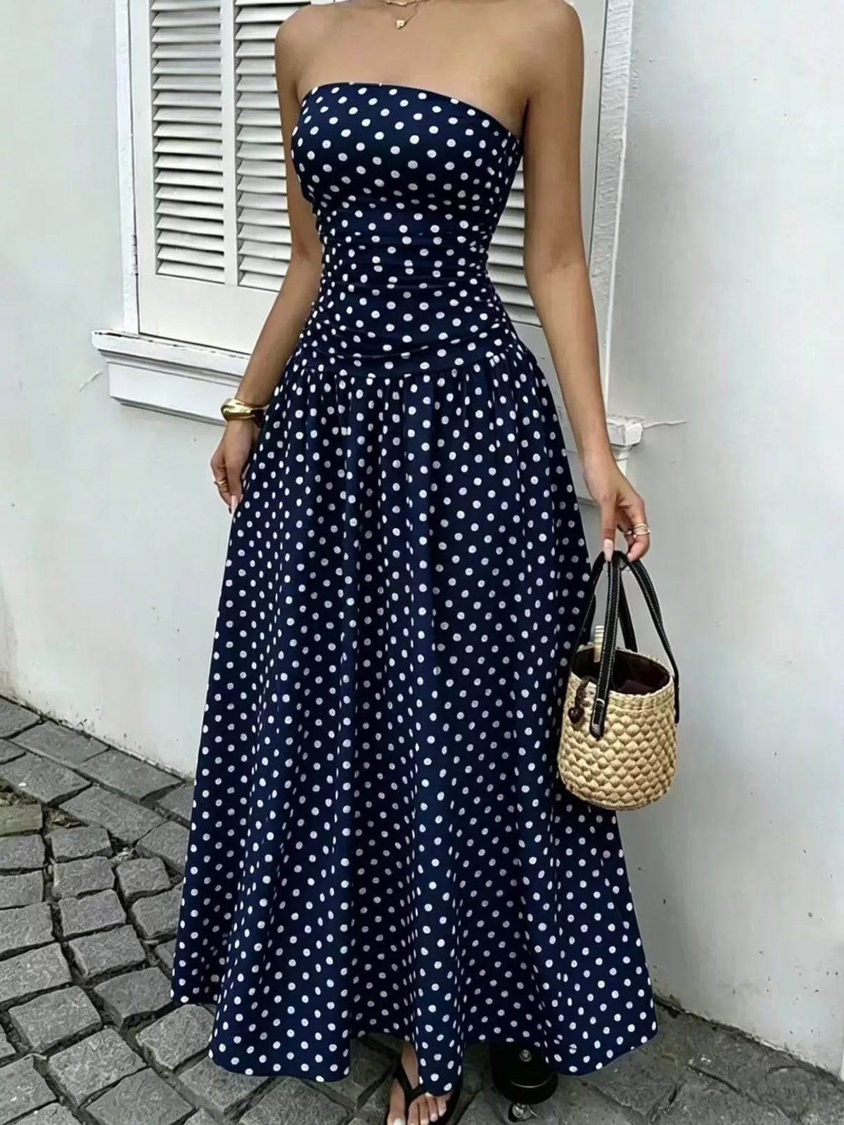 Women's Strapless Polka Dot Ruched Maxi Dress in navy dots — front view