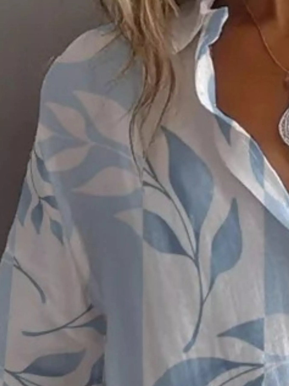 Women's Leaf Print Long Sleeve Blouse in light blue — neckline detail view