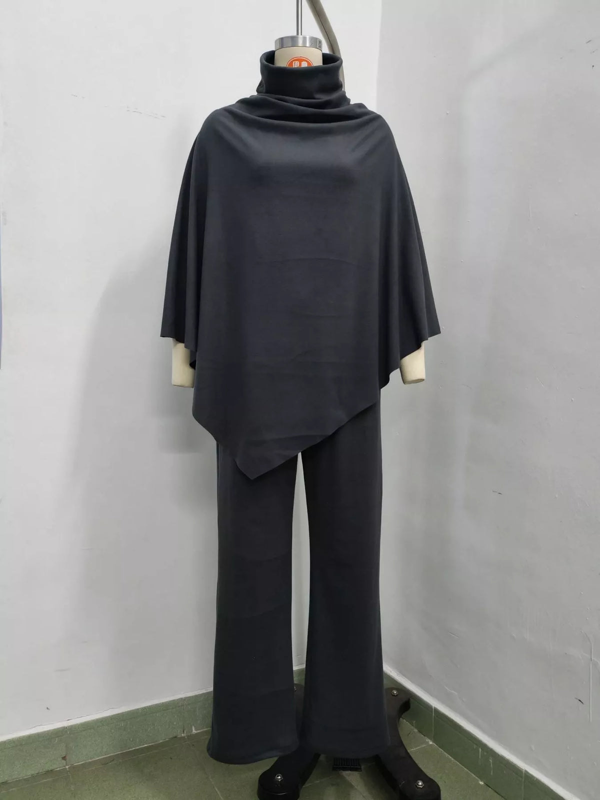Poncho and pants set, charcoal mannequin front