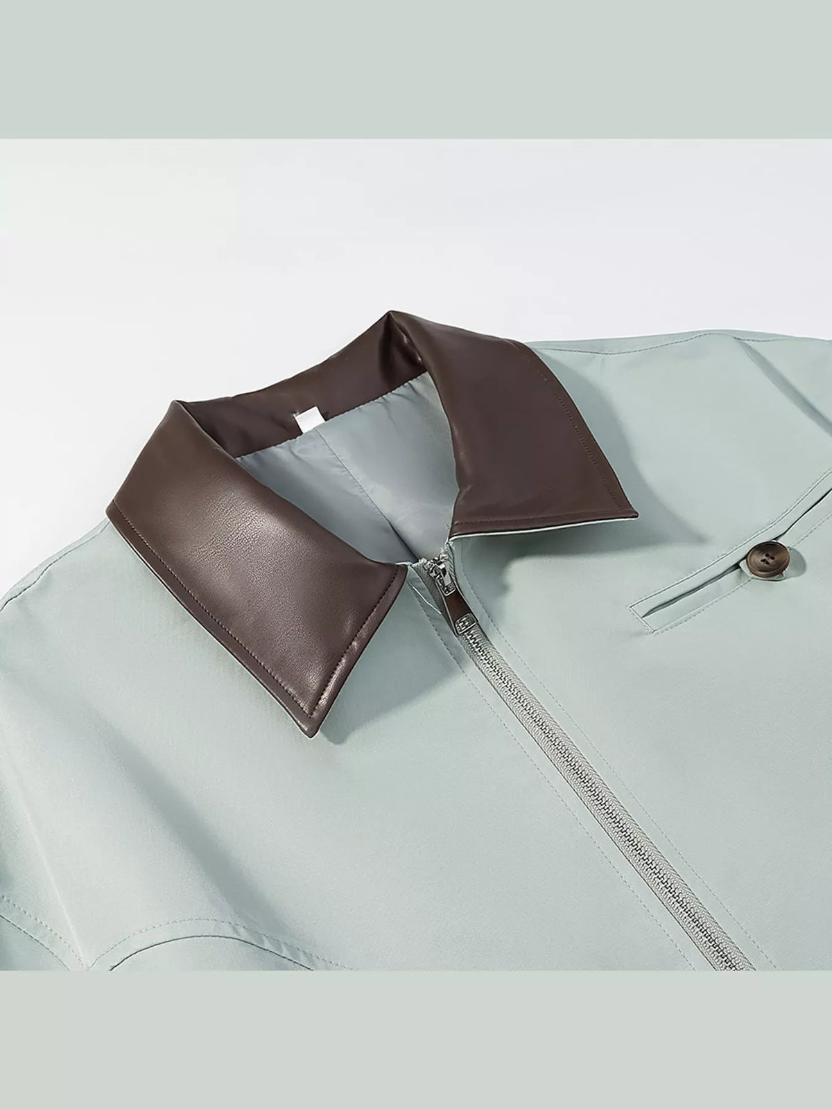 Pale gray-green contrast collar zip-up jacket — design and construction details
