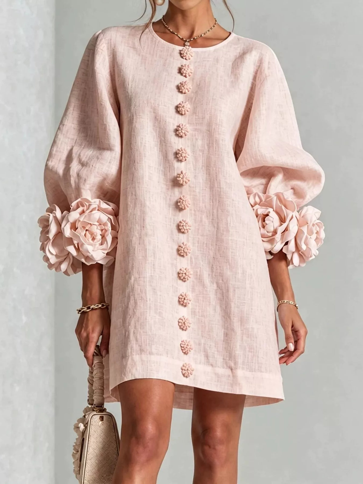 Blush button-detail dress with floral applique cuffs