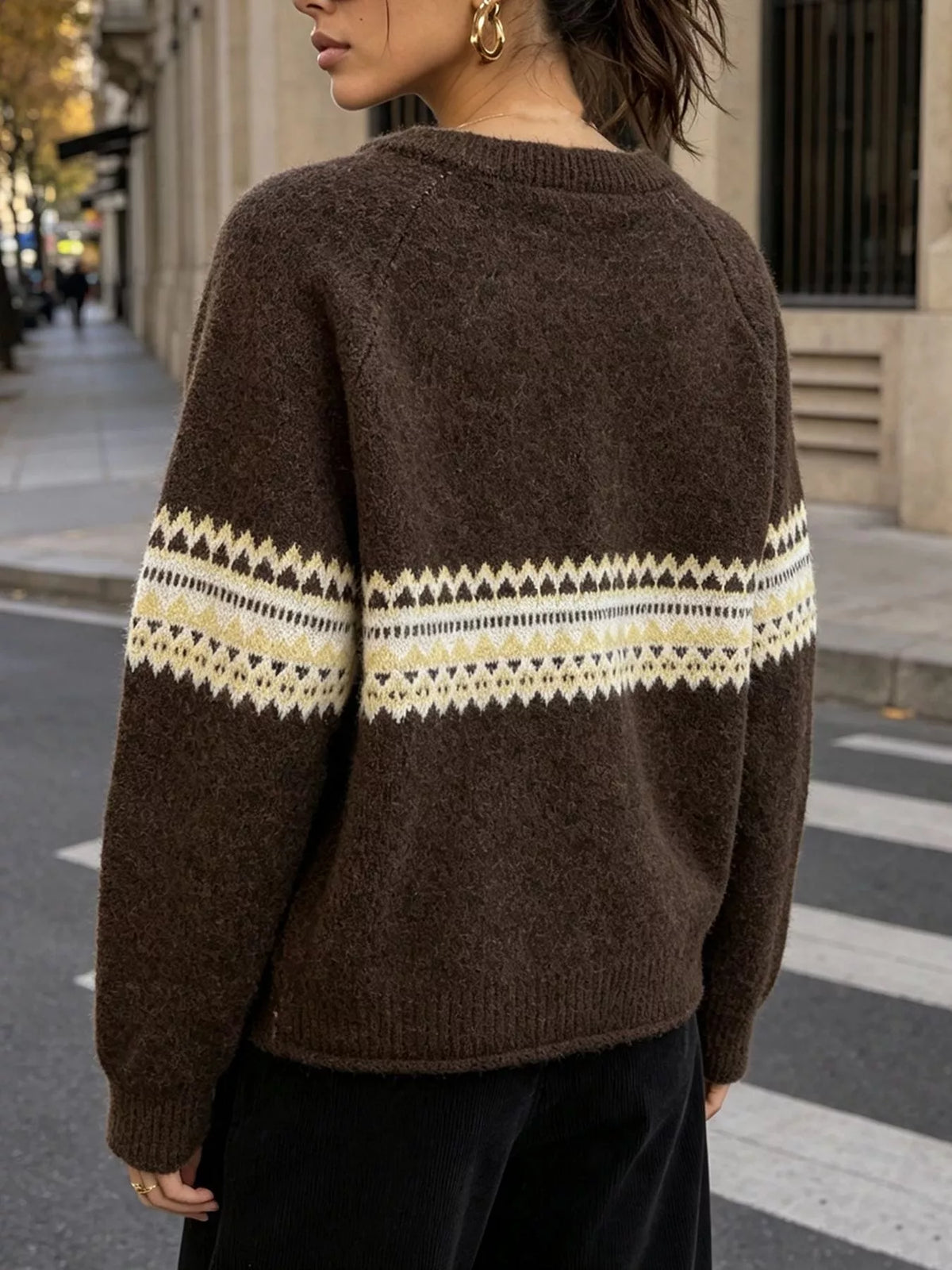 Brown geometric button-front knit cardigan, back view.