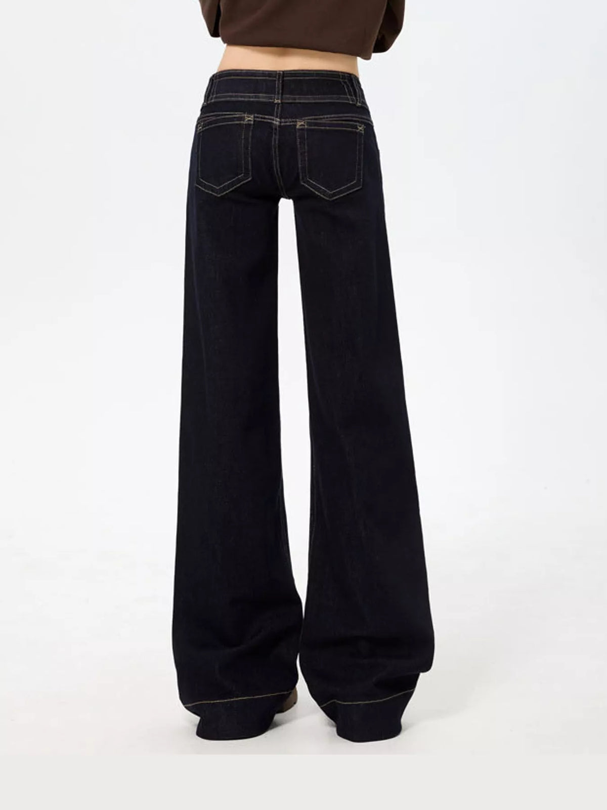 Black low-rise wide-leg jeans — back view