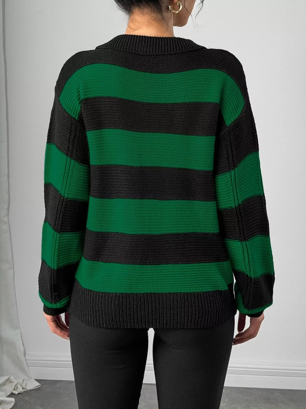 Striped polo collar sweater with floral pocket detail, back view