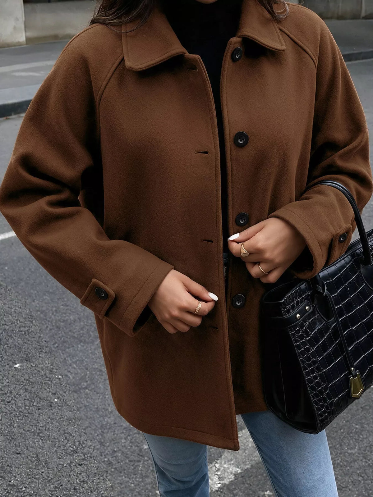Brown button-up raglan sleeve coat — front view