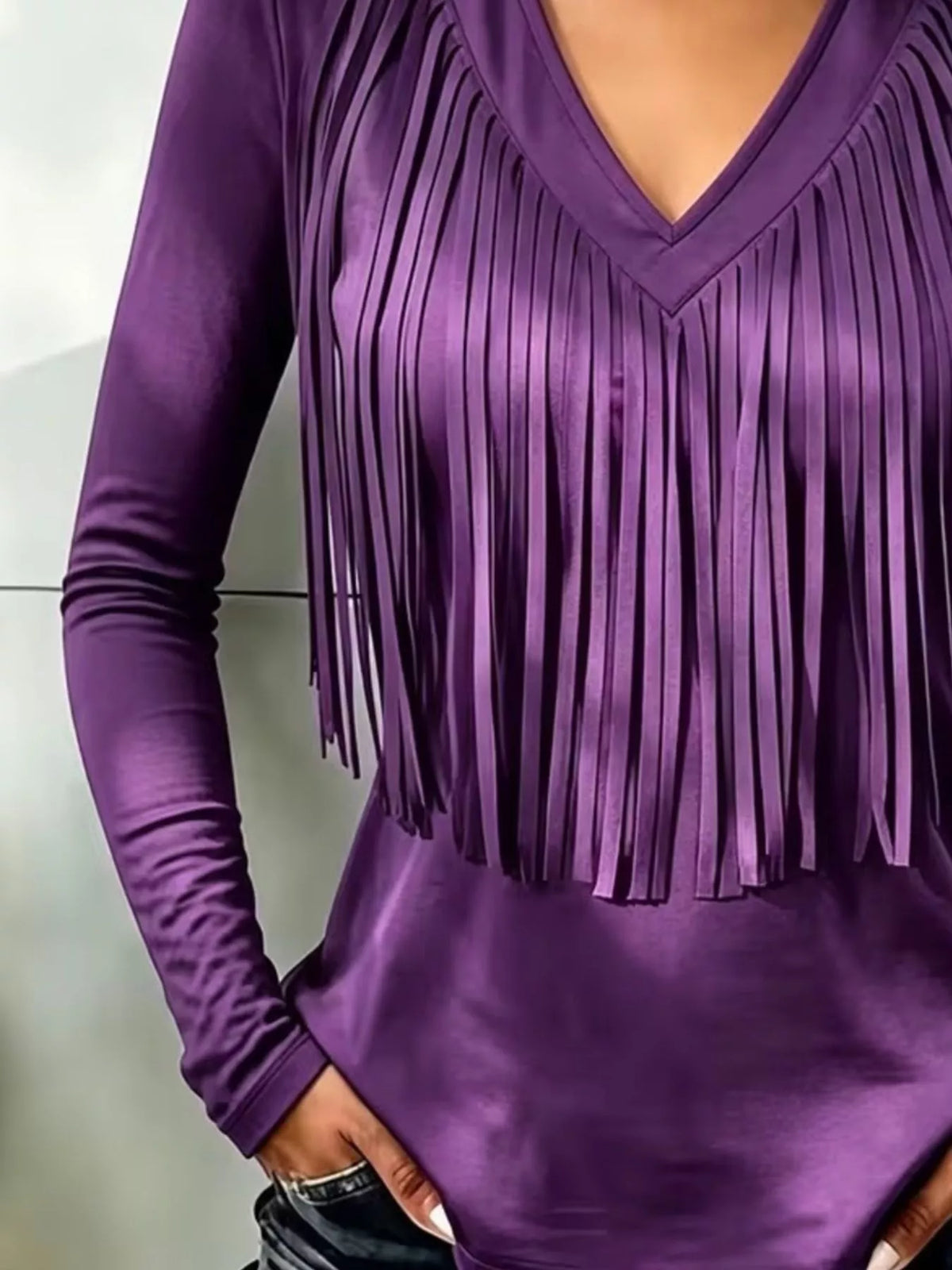 Purple fringe V-neck top, neckline and fringe close-up
