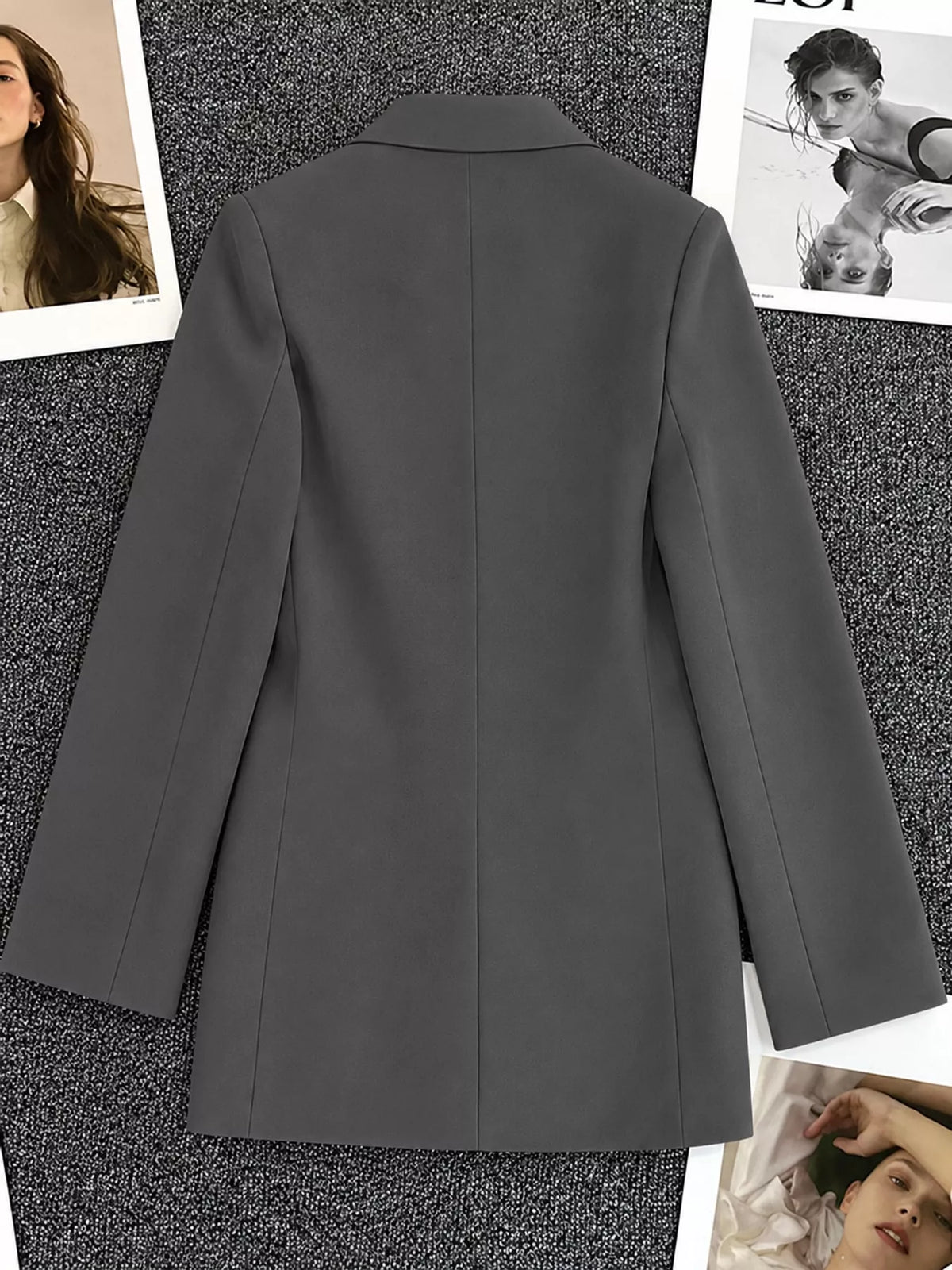 Dark gray double-breasted lapel collar blazer, back view