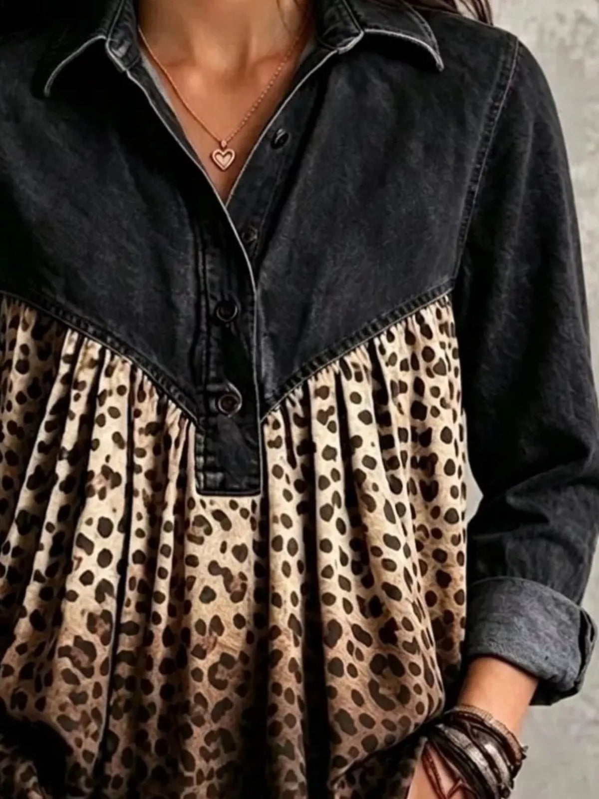 Black leopard-panel button-front blouse, button-placket and leopard-panel detail
