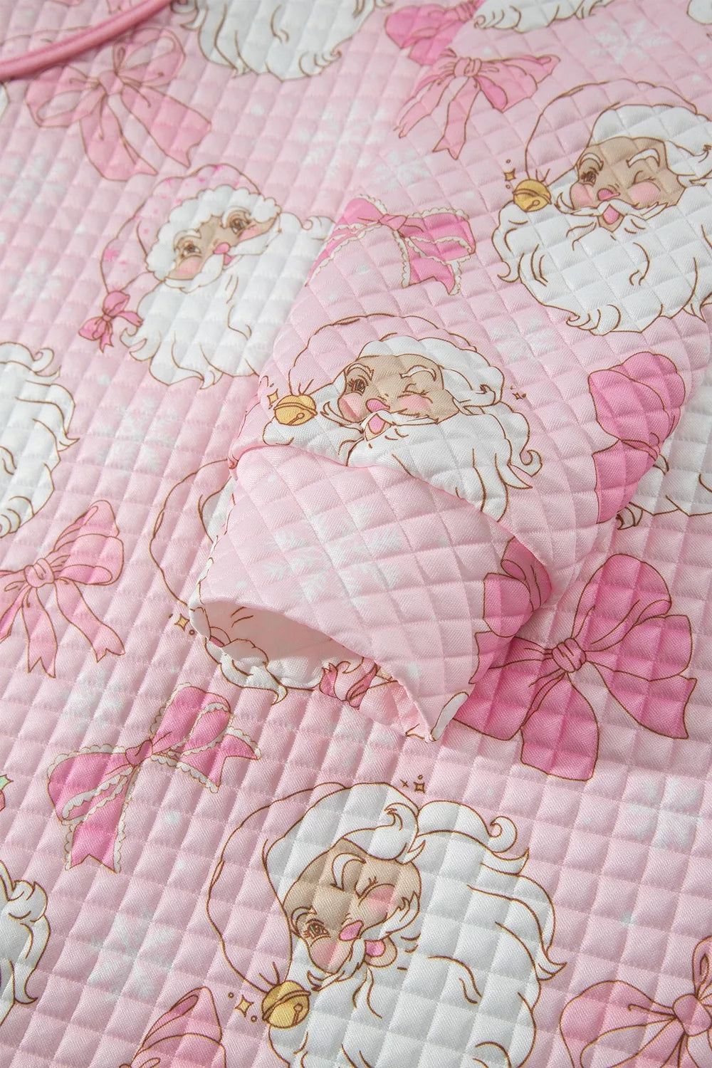 Ribbed hem on pink santa print christmas print quarter-zip sweatshirt