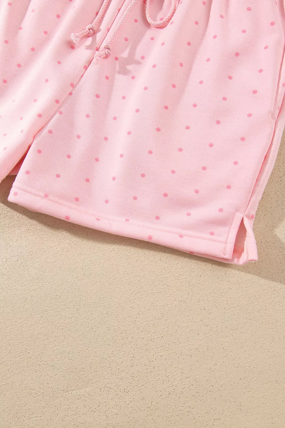Pink polka dot oversized hoodie and shorts set — design and construction details