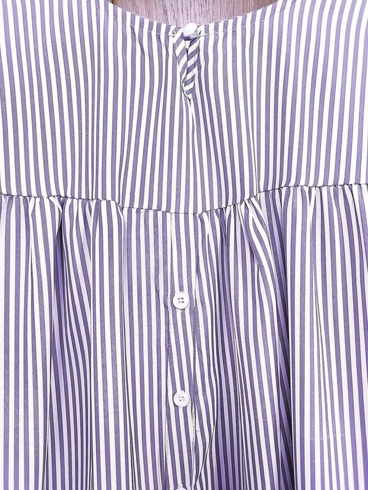 Ruffle Hem Short Sleeve Blouse — garment construction details
