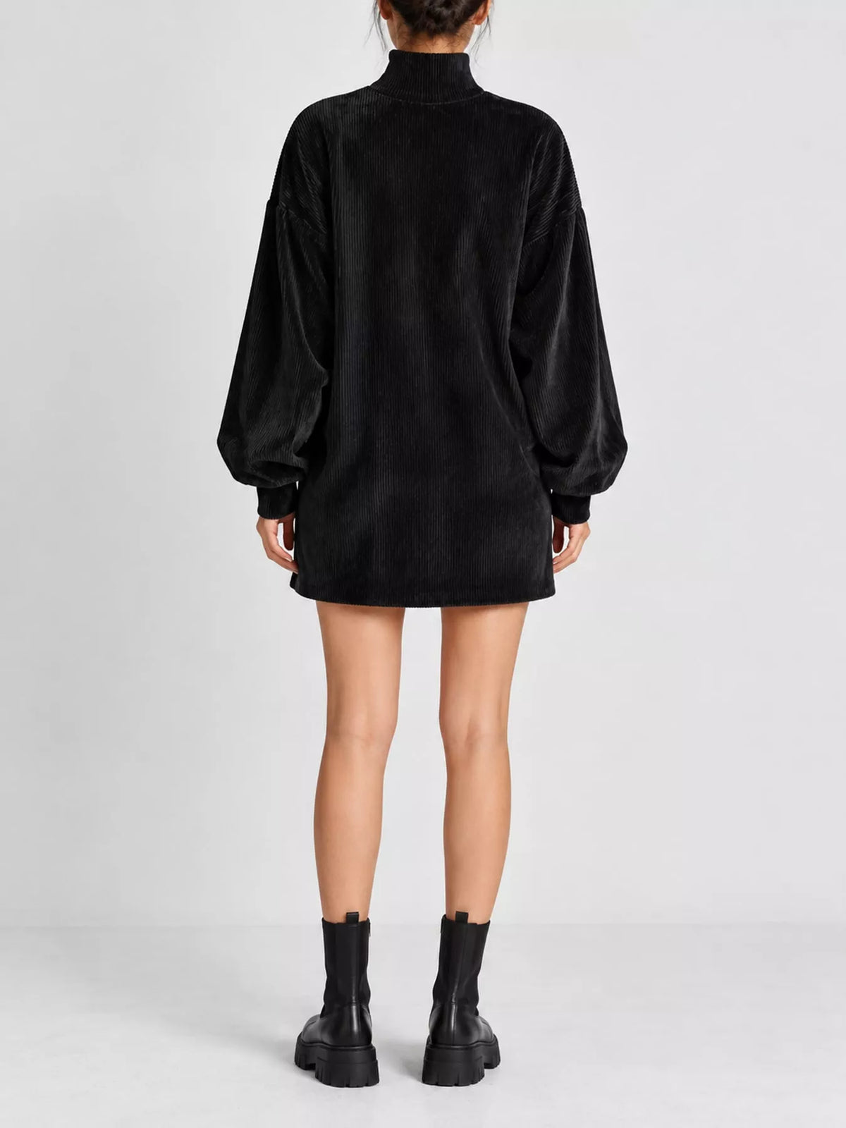 Black corduroy mock neck lantern sleeve mini dress, back view