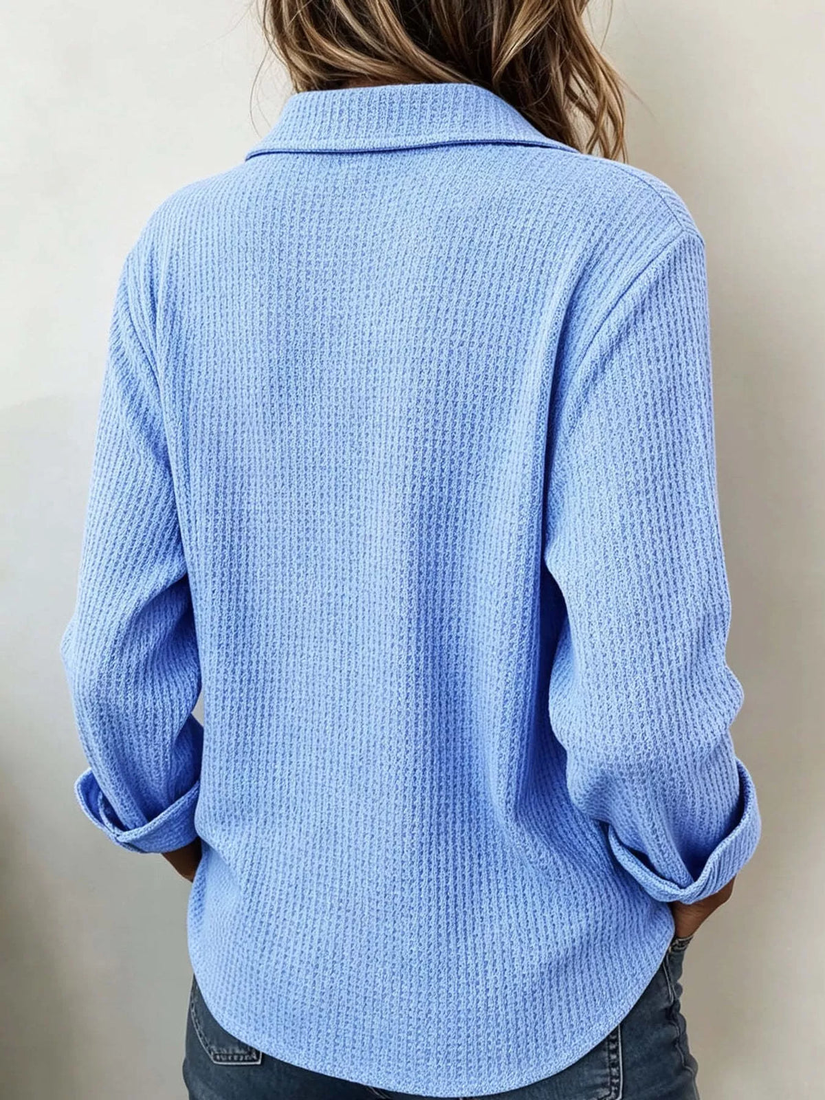 Light blue waffle knit long sleeve polo top, back view