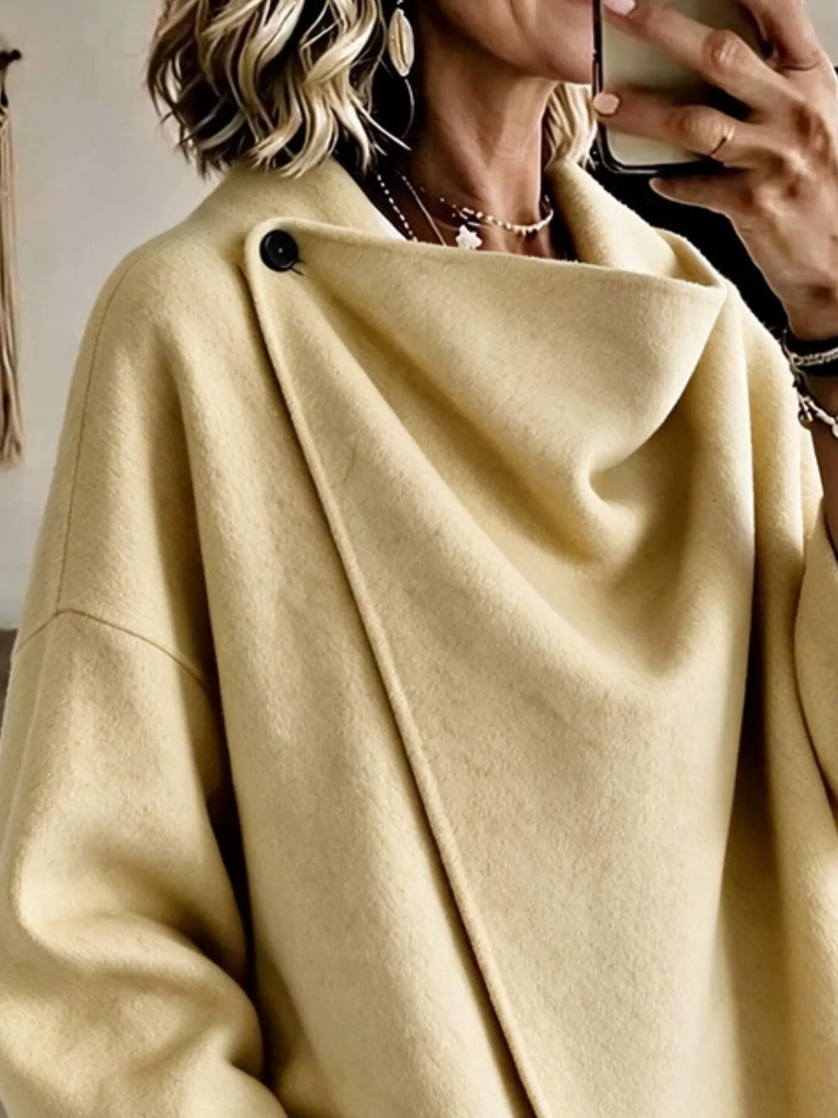 Women's Asymmetric Collar Button Detail Jacket in yellow — neckline detail view