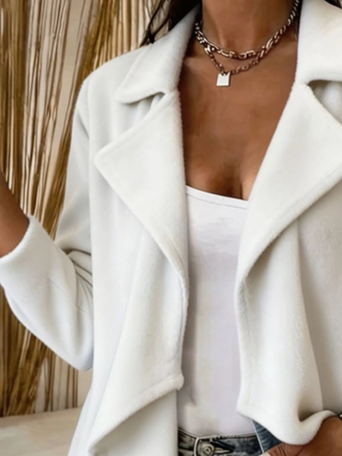 White fleece waterfall collar jacket, notch lapels and open front