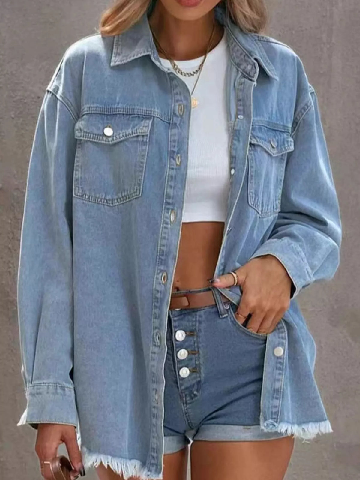 Women's Raw Hem Button Up Denim Jacket in light blue — front view