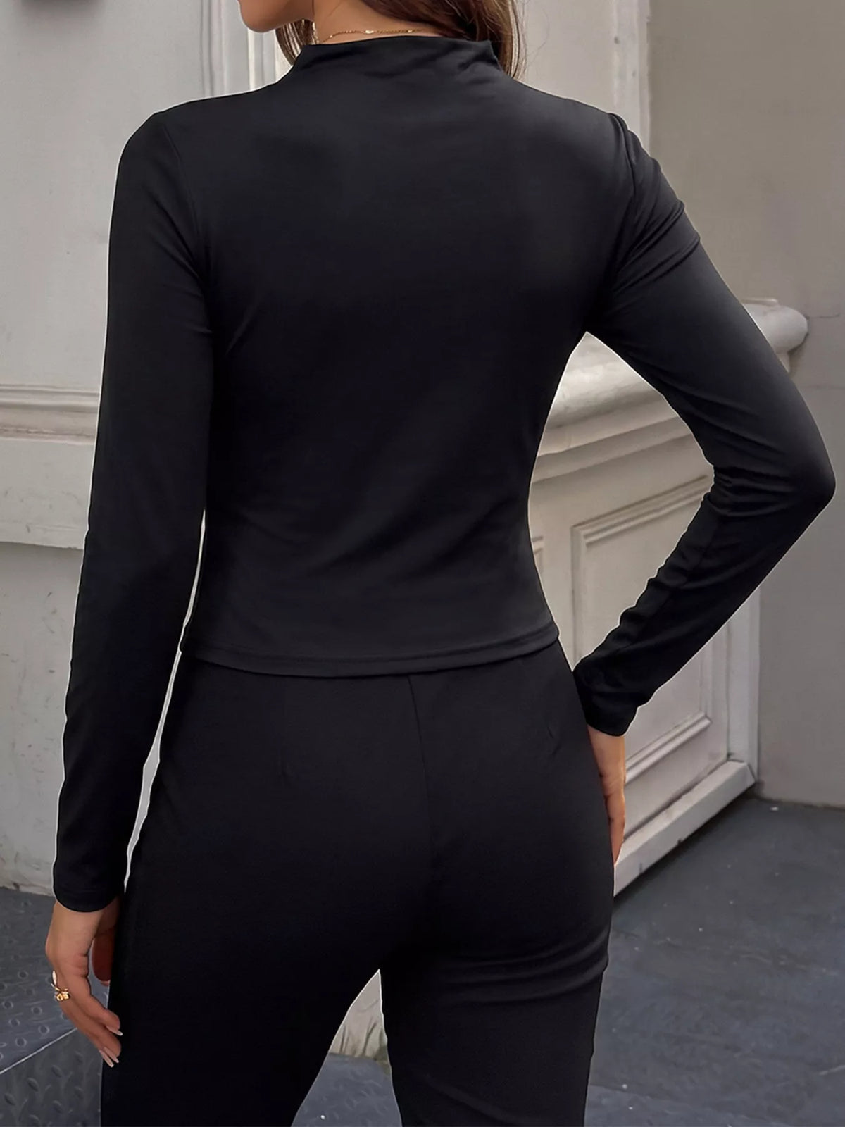 Slim Fit Long Sleeve Ruched Mock Neck T-Shirt in black, back view