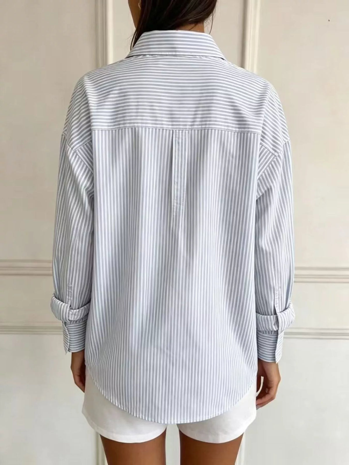 Light blue striped long sleeve shirt, back view