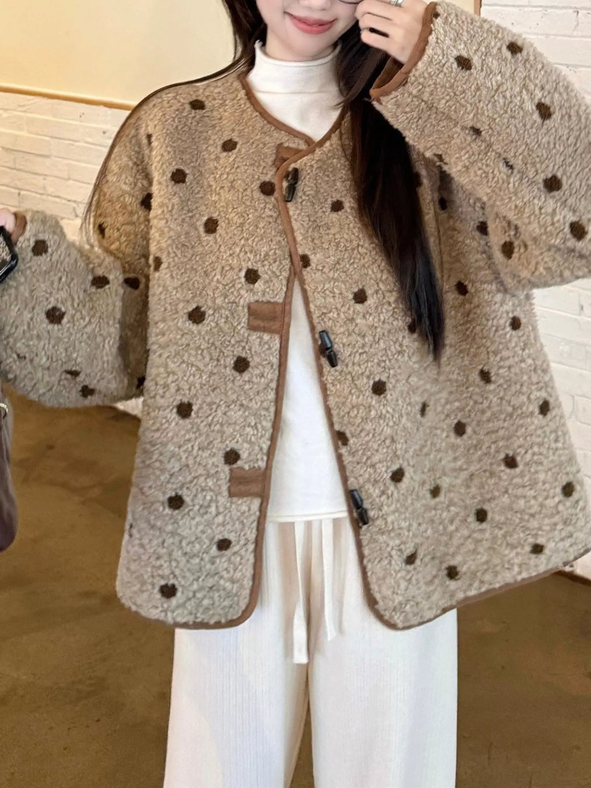 Beige with brown polka dots polka dot toggle jacket, front view