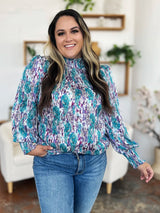Trendsi Double Take Full Size Printed Smocked Long Sleeve Blouse -