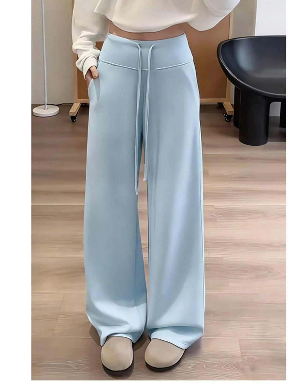 Light blue drawstring wide-leg pants — front view