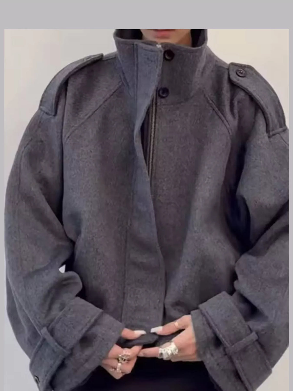 Gray zip-up stand-collar jacket — front view