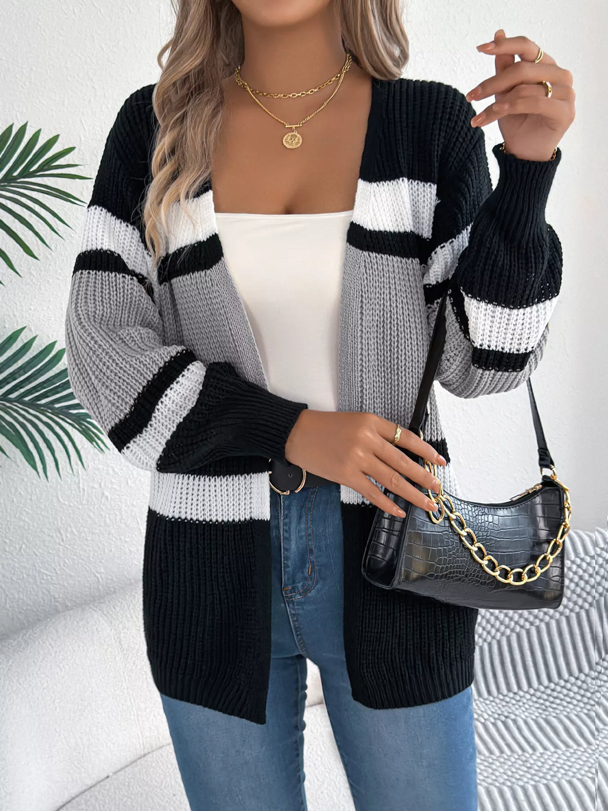 Black and white color block open front knit cardigan