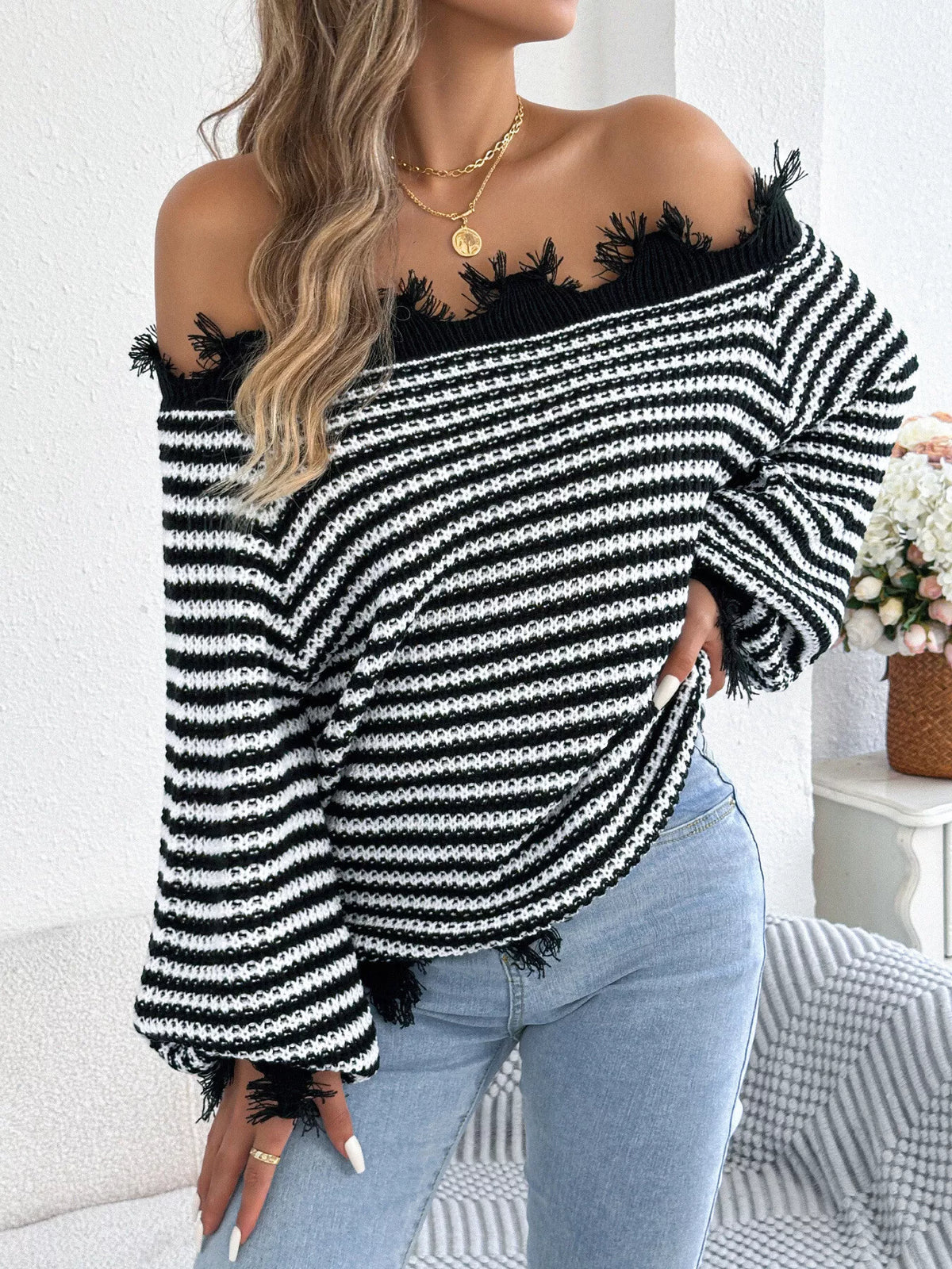 Black off-shoulder frayed hem striped sweater