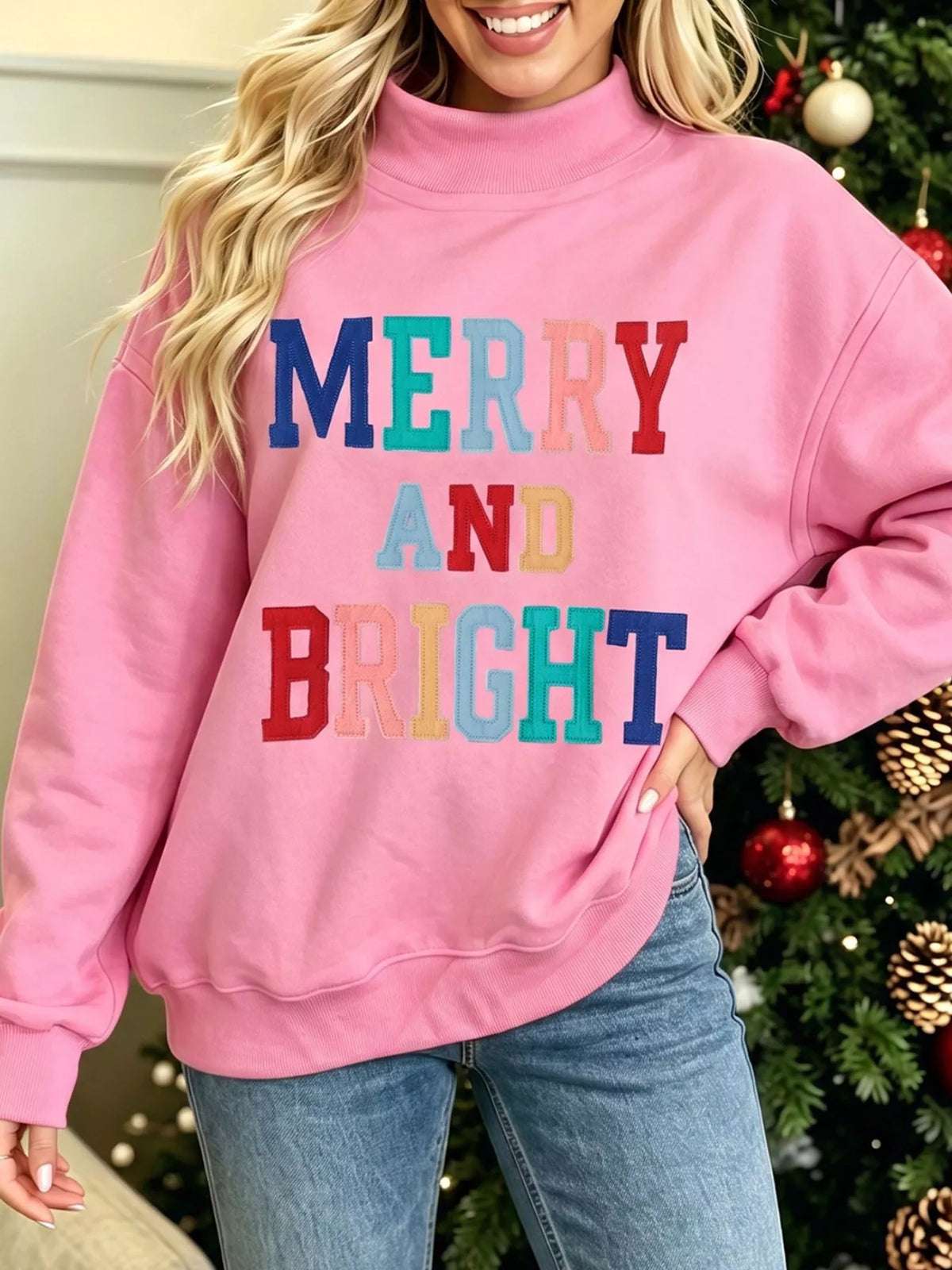 MERRY AND BRIGHT sweatshirt, pink angled front