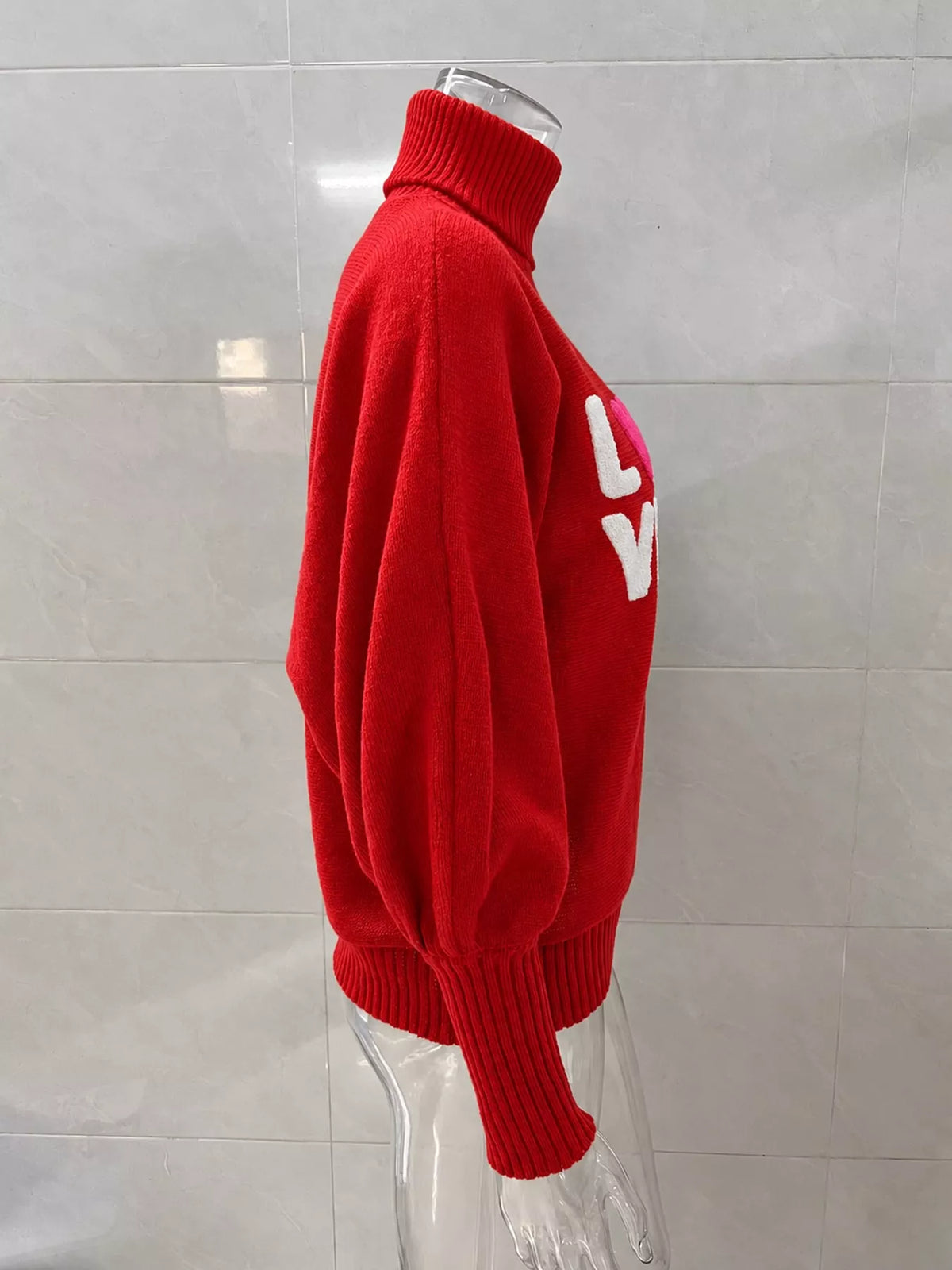 Red LOVE lettering turtleneck sweater