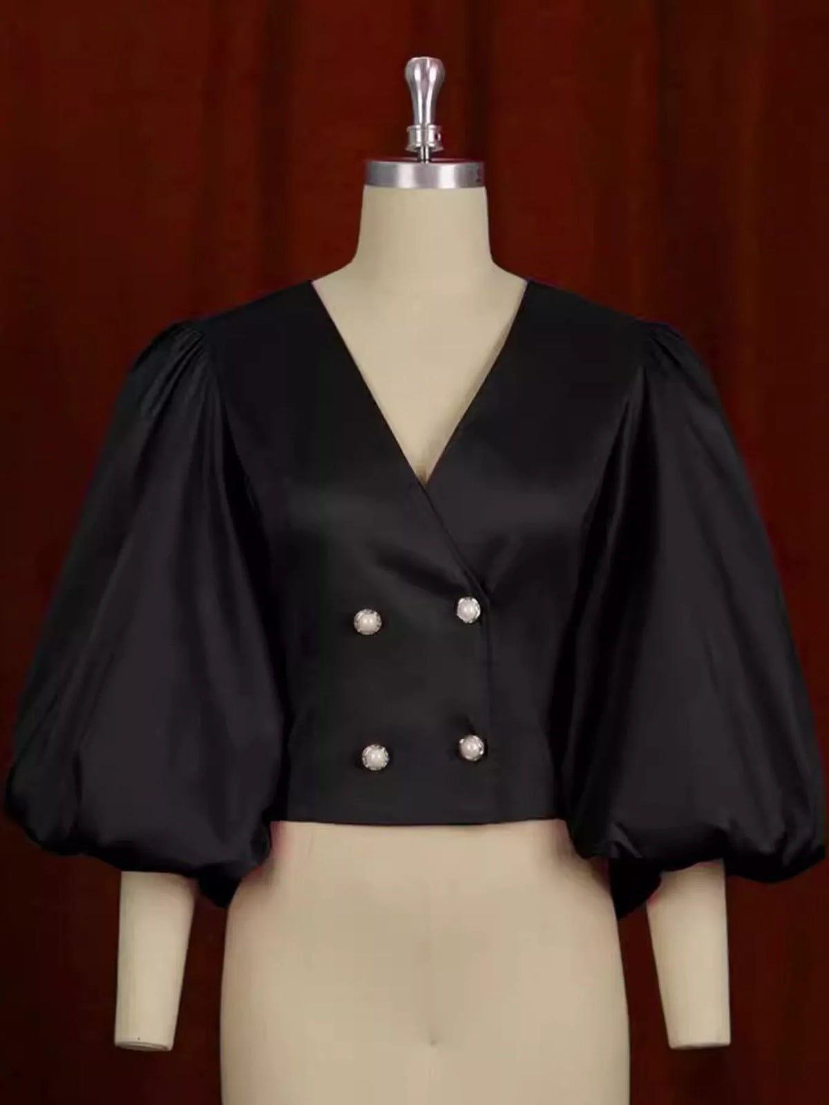 Black double-breasted puff sleeve blouse, product view