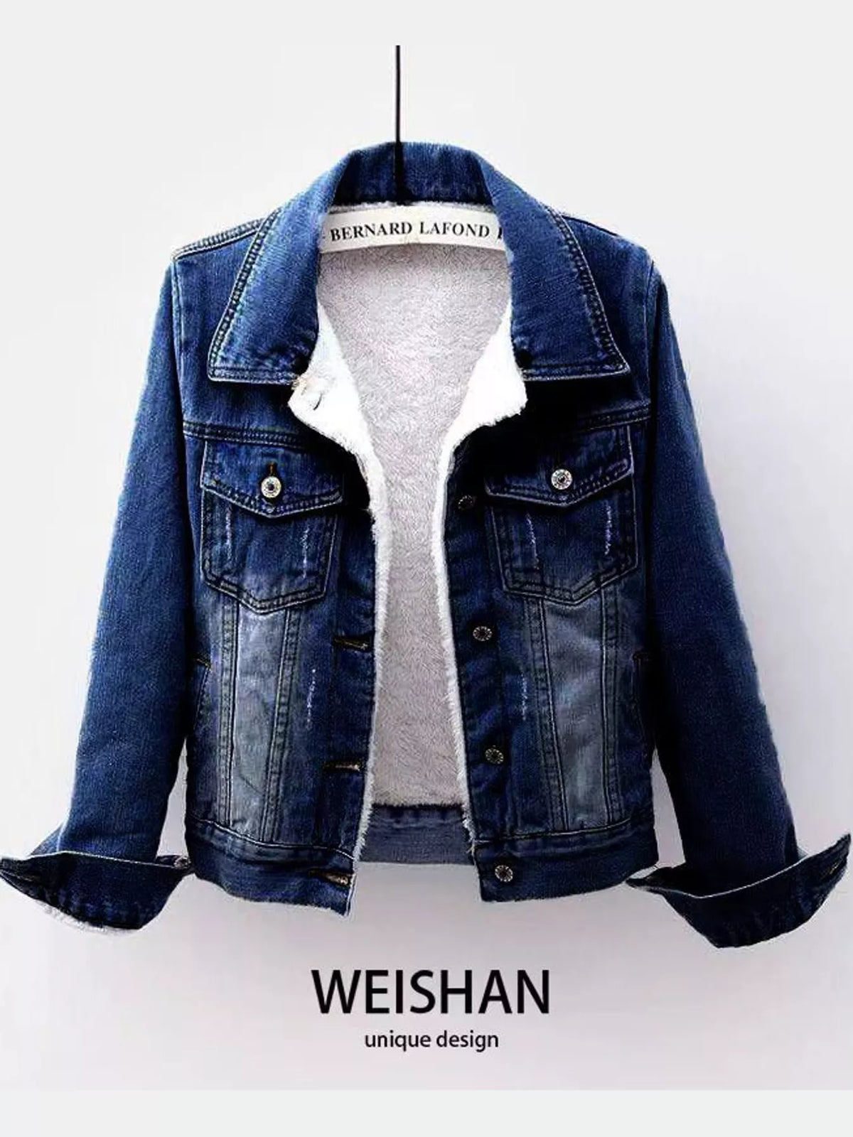 Medium blue distressed denim jacket with sherpa fleece lining