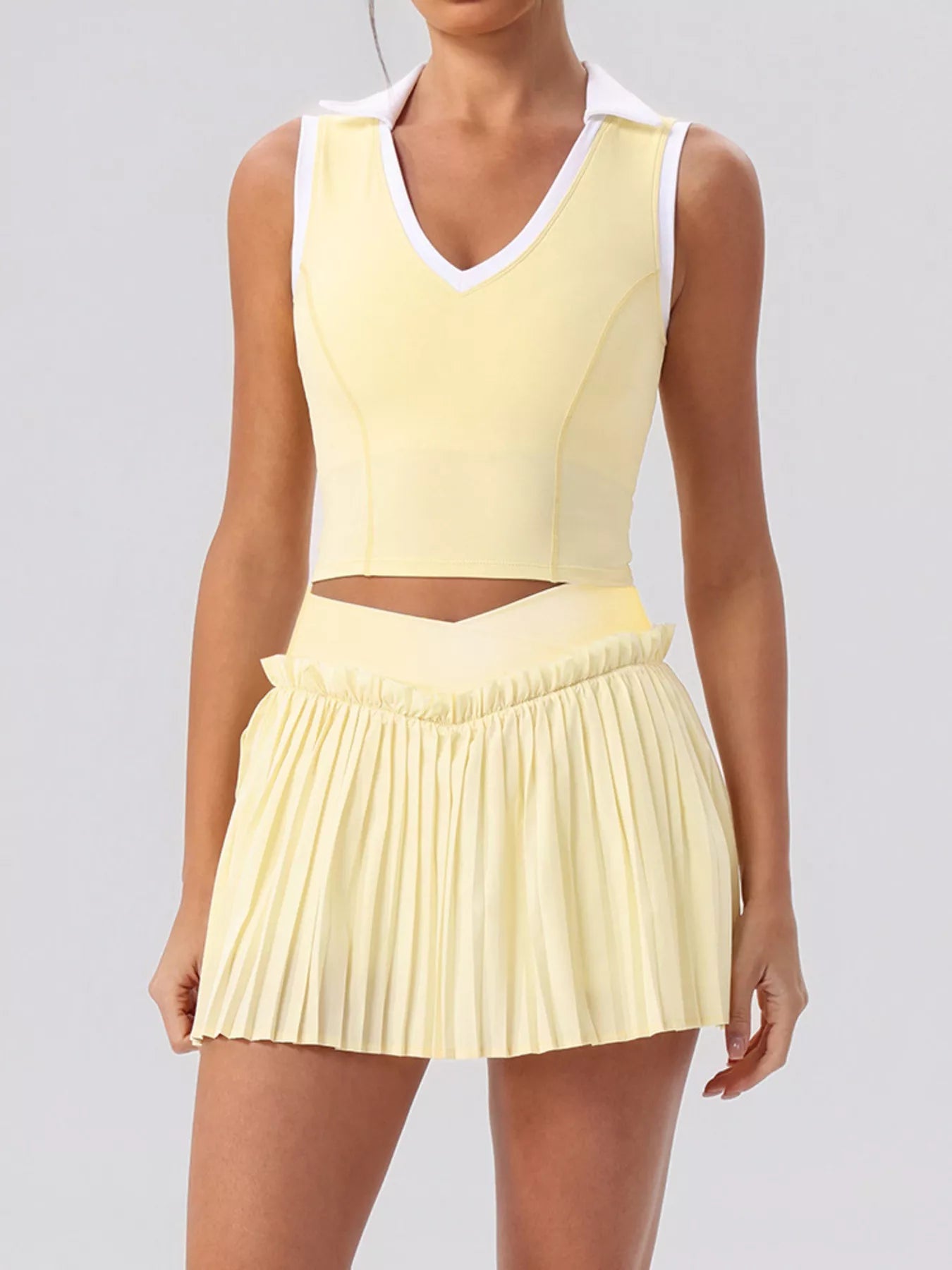 Trendsi Sleeveless Top and Pleated Skirt Active Set -