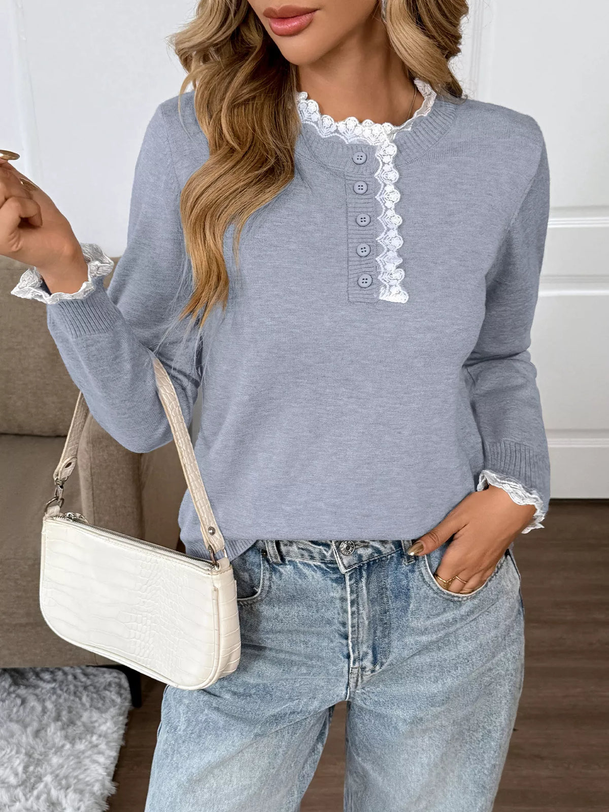 Light blue lace-trim sweater with button-detail neckline