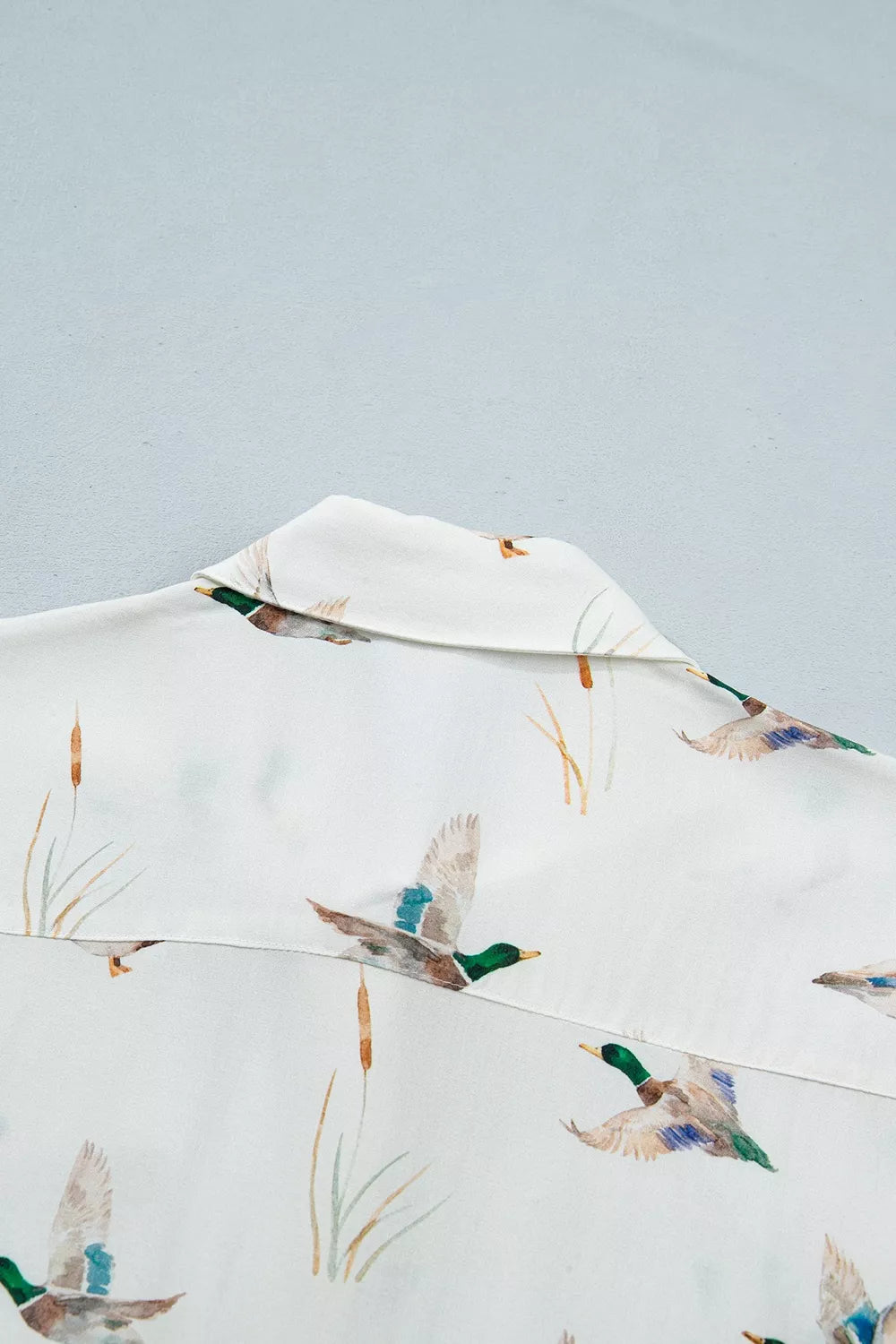Trendsi Mallard Printed Button Flap Pocket Short Sleeve Shirt -