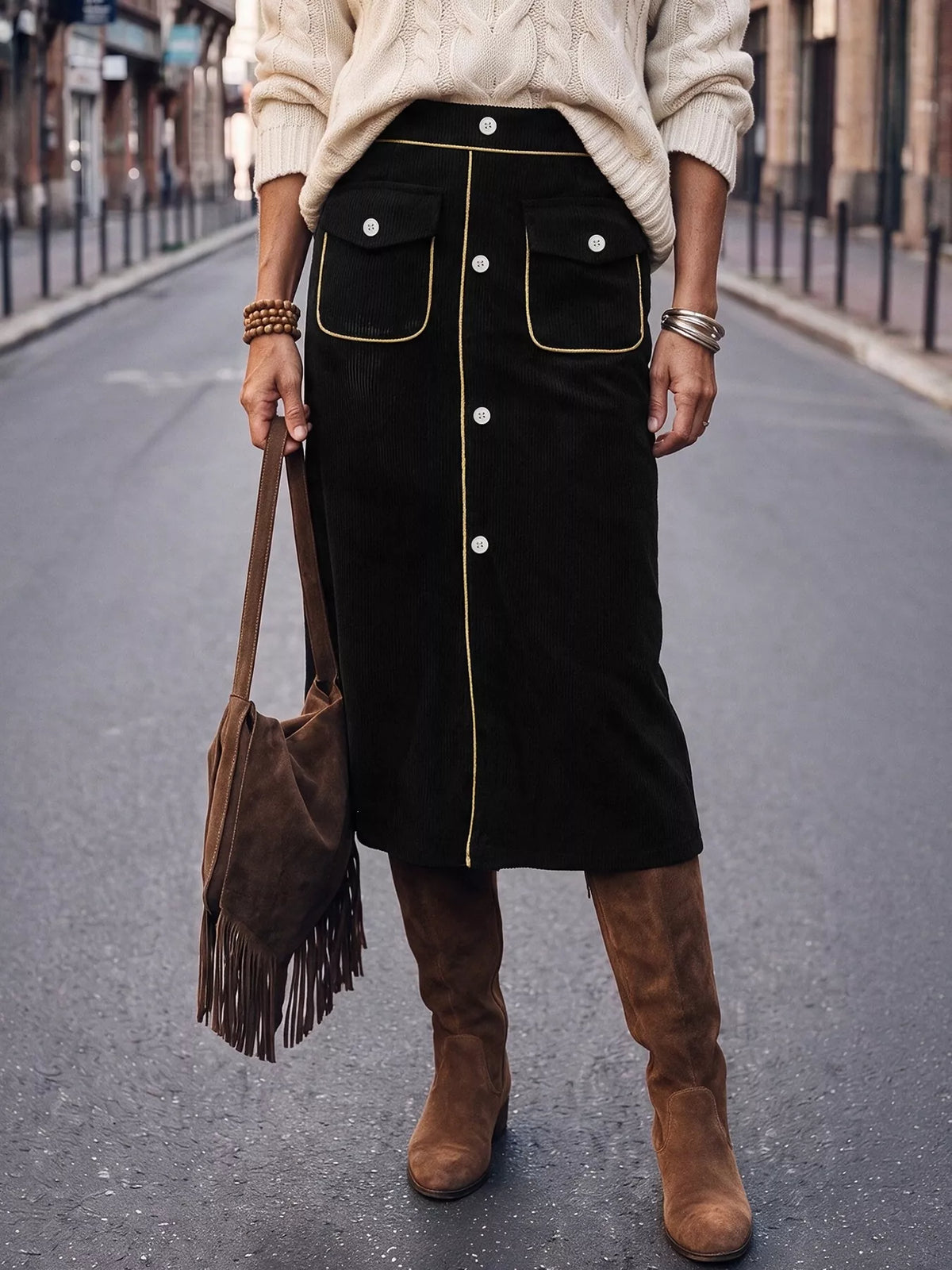 Black corduroy button-front midi skirt, front view